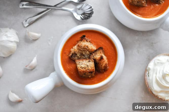 Creamy Tomato Soup with Brown Butter Garlic Croutons I howsweeteats.com Creamy Tomato Soup with Brown Butter Garlic Croutons I howsweeteats.com
