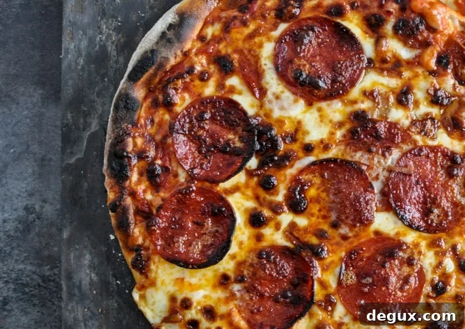How to Make Pizza in a Cast Iron Skillet I howsweeteats.com How to Make Pizza in a Cast Iron Skillet I howsweeteats.com