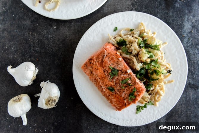 Broiled Salmon and Roasted Garlic Cream Noodles with Crispy Cauliflower + Toasted Pine Nuts Broiled Salmon and Roasted Garlic Cream Noodles with Crispy Cauliflower + Toasted Pine Nuts