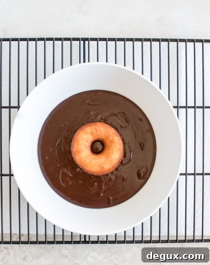 Chocolate Frosted Cake Donuts I howsweeteats.com