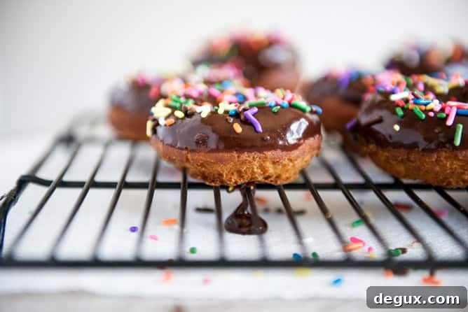 Chocolate Frosted Cake Donuts I howsweeteats.com