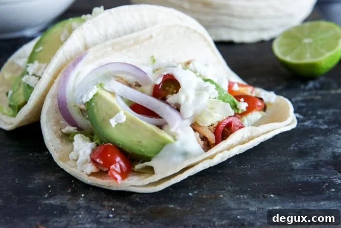 Smoky Roasted Chicken Tacos with Spicy Goat Cheese Queso Smoky Roasted Chicken Tacos with Spicy Goat Cheese Queso