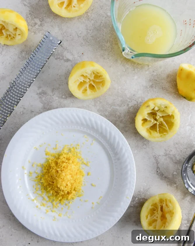 Easy Lemon Cake with Marshmallow Frosting + Toasted Coconut I howsweeteats.com