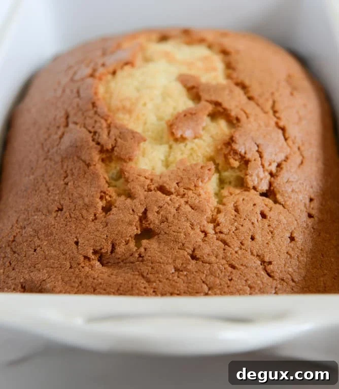 Spiked Almond Joy Poundcake I howsweeteats.com Spiked Almond Joy Poundcake I howsweeteats.com