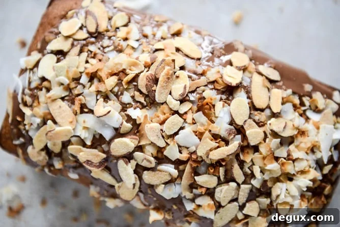 Spiked Almond Joy Poundcake I howsweeteats.com Spiked Almond Joy Poundcake I howsweeteats.com