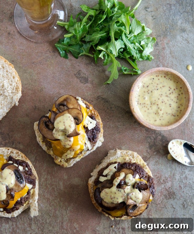 Cheeseburgers with Sautéed Mushrooms, Arugula and Dijon Aioli