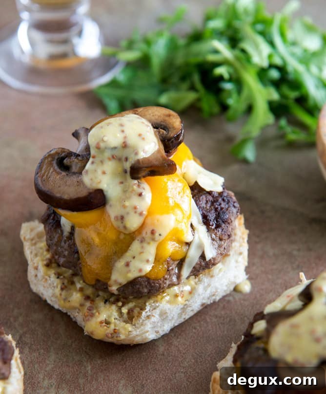 Cheeseburgers with Sautéed Mushrooms, Arugula and Dijon Aioli