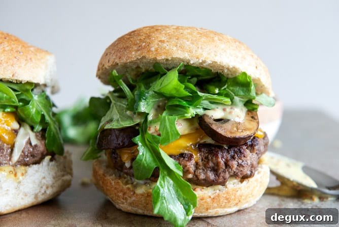 Cheeseburgers with Sautéed Mushrooms, Arugula and Dijon Aioli