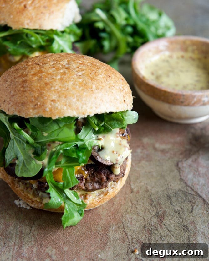Cheeseburgers with Sautéed Mushrooms, Arugula and Dijon Aioli
