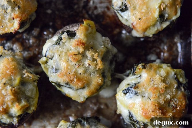 Spinach, Bacon + Artichoke Stuffed Portobellos I howsweeteats.com