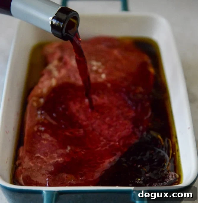 Red Wine Marinated Flank Steak with Cherry Tomato Caprese Salsa I howsweeteats.com