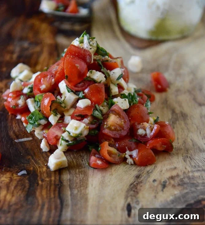 Red Wine Marinated Flank Steak with Cherry Tomato Caprese Salsa I howsweeteats.com
