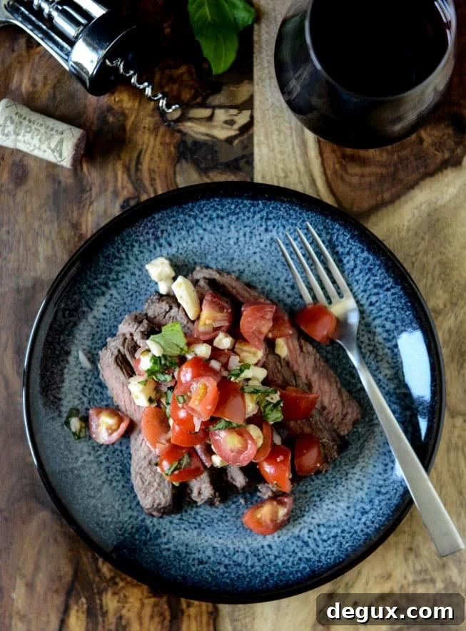Red Wine Marinated Flank Steak with Cherry Tomato Caprese Salsa I howsweeteats.com
