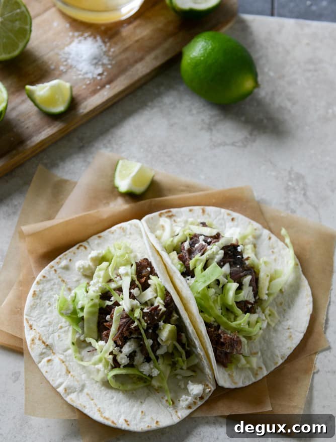 Crockpot Short Rib Tacos with Salted Lime Cabbage and Queso Fresco I howsweeteats.com Crockpot Short Rib Tacos with Salted Lime Cabbage and Queso Fresco I howsweeteats.com