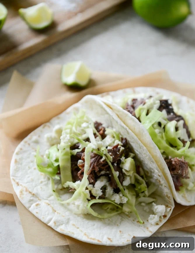 Crockpot Short Rib Tacos with Salted Lime Cabbage and Queso Fresco I howsweeteats.com Crockpot Short Rib Tacos with Salted Lime Cabbage and Queso Fresco I howsweeteats.com