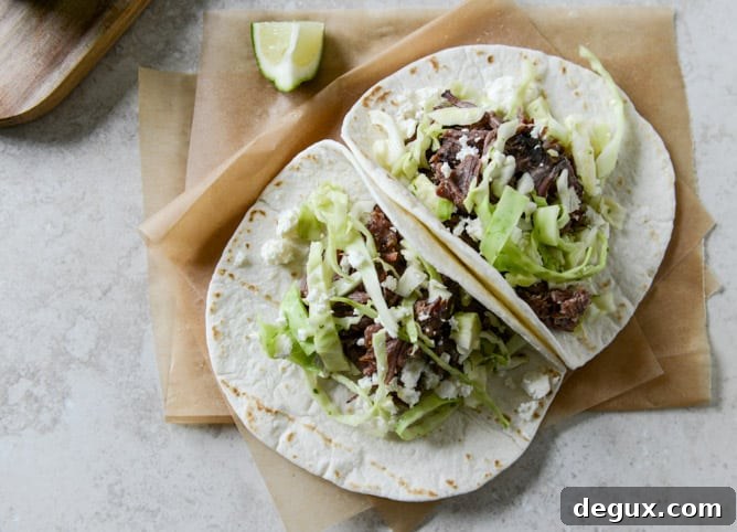Crockpot Short Rib Tacos with Salted Lime Cabbage and Queso Fresco I howsweeteats.com Crockpot Short Rib Tacos with Salted Lime Cabbage and Queso Fresco I howsweeteats.com