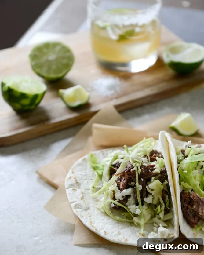 Crockpot Short Rib Tacos with Salted Lime Cabbage and Queso Fresco I howsweeteats.com Crockpot Short Rib Tacos with Salted Lime Cabbage and Queso Fresco I howsweeteats.com