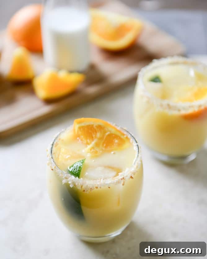 Coconut Creamsicle Margaritas I howsweeteats.com