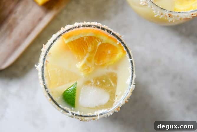 Coconut Creamsicle Margaritas I howsweeteats.com