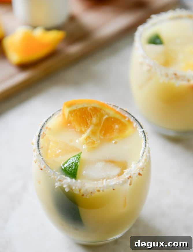 Coconut Creamsicle Margaritas I howsweeteats.com