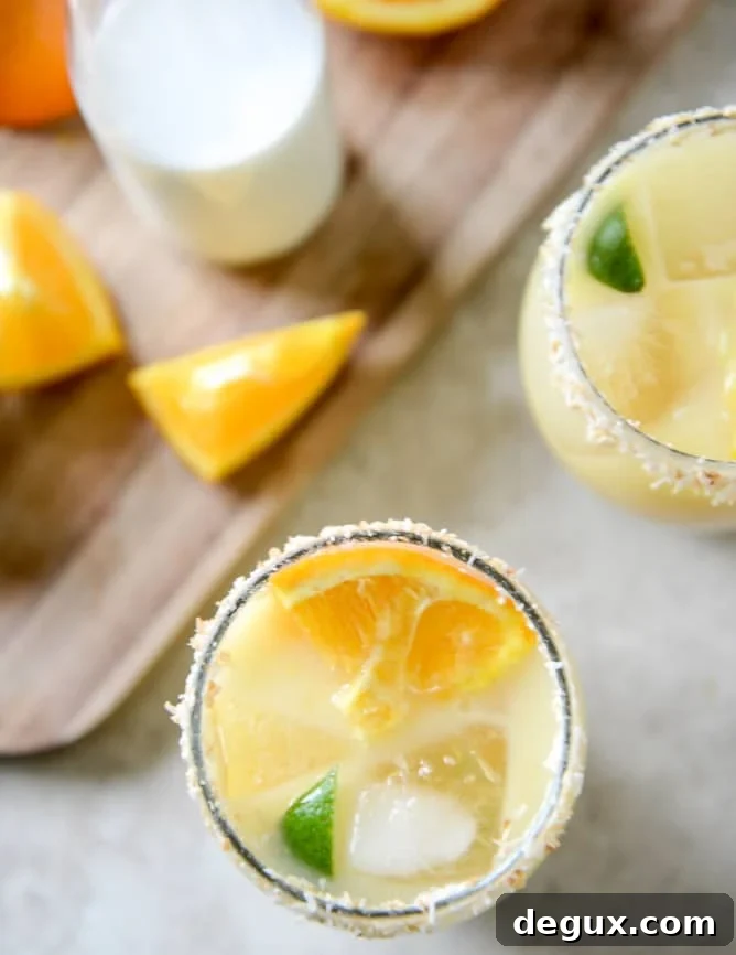 Coconut Creamsicle Margaritas I howsweeteats.com