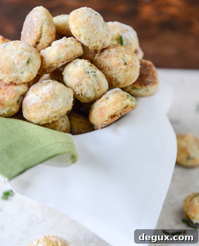Mini Cream Cheese + Chive Biscuits I howsweeteats.com Mini Cream Cheese + Chive Biscuits I howsweeteats.com