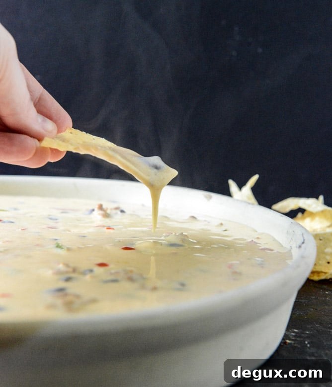 Spicy Beer Queso with Chorizo and Black Beans I howsweeteats.com