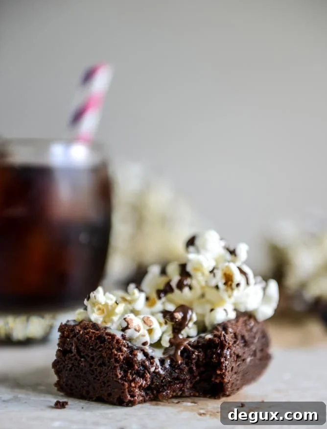 Buttered Popcorn Crunch Brownies I howsweeteats.com Buttered Popcorn Crunch Brownies I howsweeteats.com