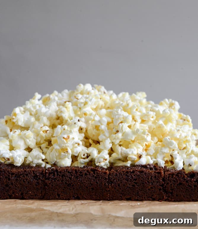 Buttered Popcorn Crunch Brownies I howsweeteats.com Buttered Popcorn Crunch Brownies I howsweeteats.com