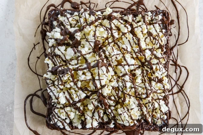 Buttered Popcorn Crunch Brownies I howsweeteats.com Buttered Popcorn Crunch Brownies I howsweeteats.com