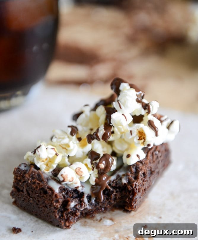 Buttered Popcorn Crunch Brownies I howsweeteats.com Buttered Popcorn Crunch Brownies I howsweeteats.com
