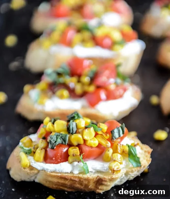 Summer Crostini with Whipped Roasted Garlic Goat Cheese