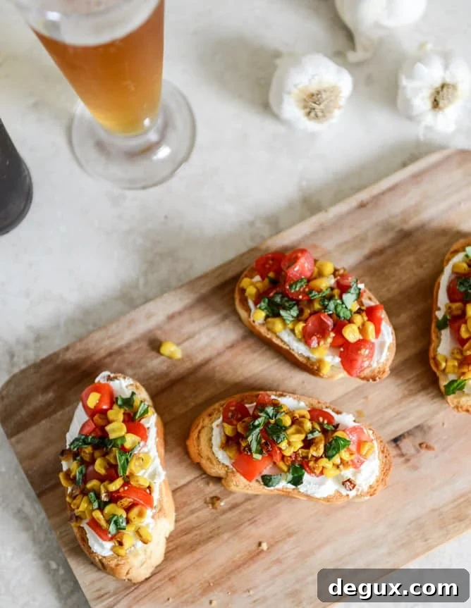 Summer Crostini with Whipped Roasted Garlic Goat Cheese