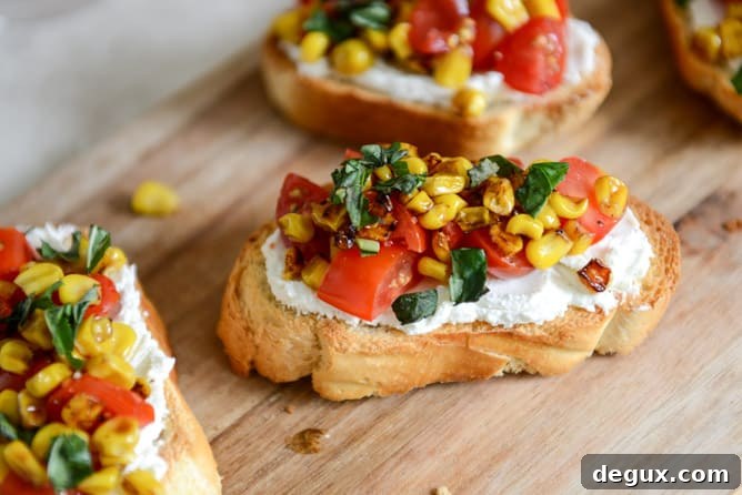 Summer Crostini with Whipped Roasted Garlic Goat Cheese I howsweeteats.com