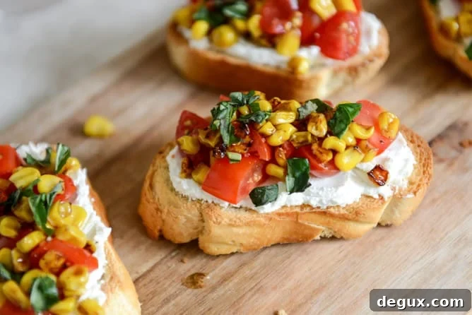 Summer Crostini with Whipped Roasted Garlic Goat Cheese