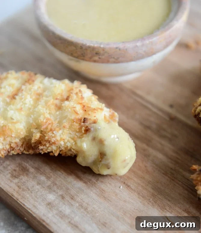 Crunchy Coconut Chicken Fingers with Peach Honey Mustard I howsweeteats.com