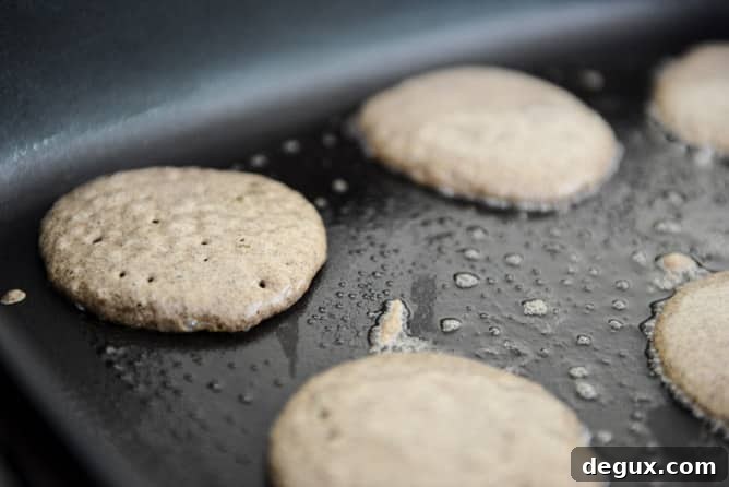 Mini Buckwheat Bacon Pancakes with Bourbon Syrup I howsweeteats.com