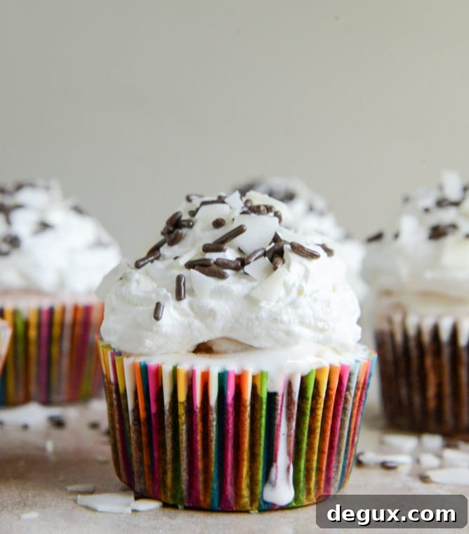 Fudge Brownie and Coconut Ice Cream Cupcakes I howsweeteats.com