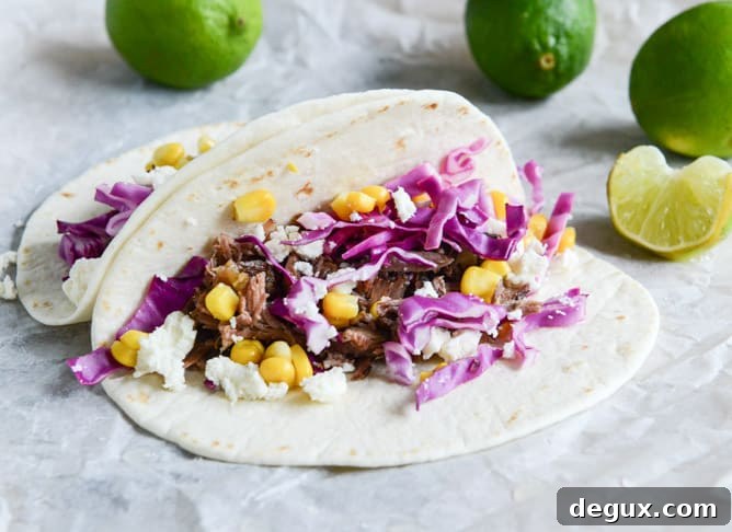 Crockpot Smoky Brisket Tacos with Shredded Cabbage + Sweet Corn I howsweeteats.com