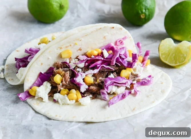 Crockpot Smoky Brisket Tacos with Shredded Cabbage + Sweet Corn I howsweeteats.com