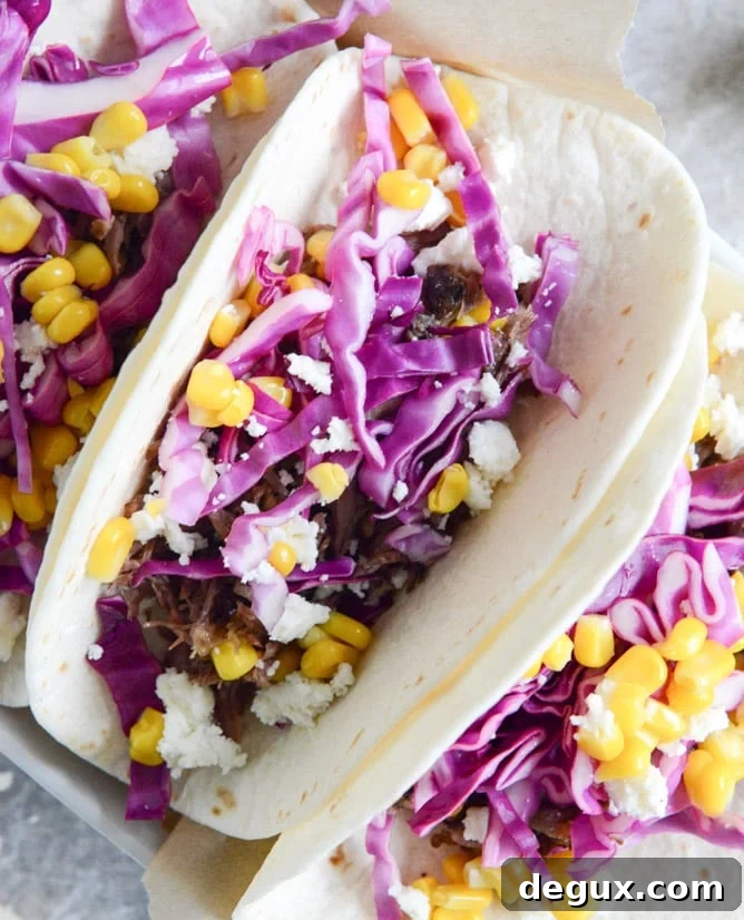 Crockpot Smoky Brisket Tacos with Shredded Cabbage + Sweet Corn I howsweeteats.com