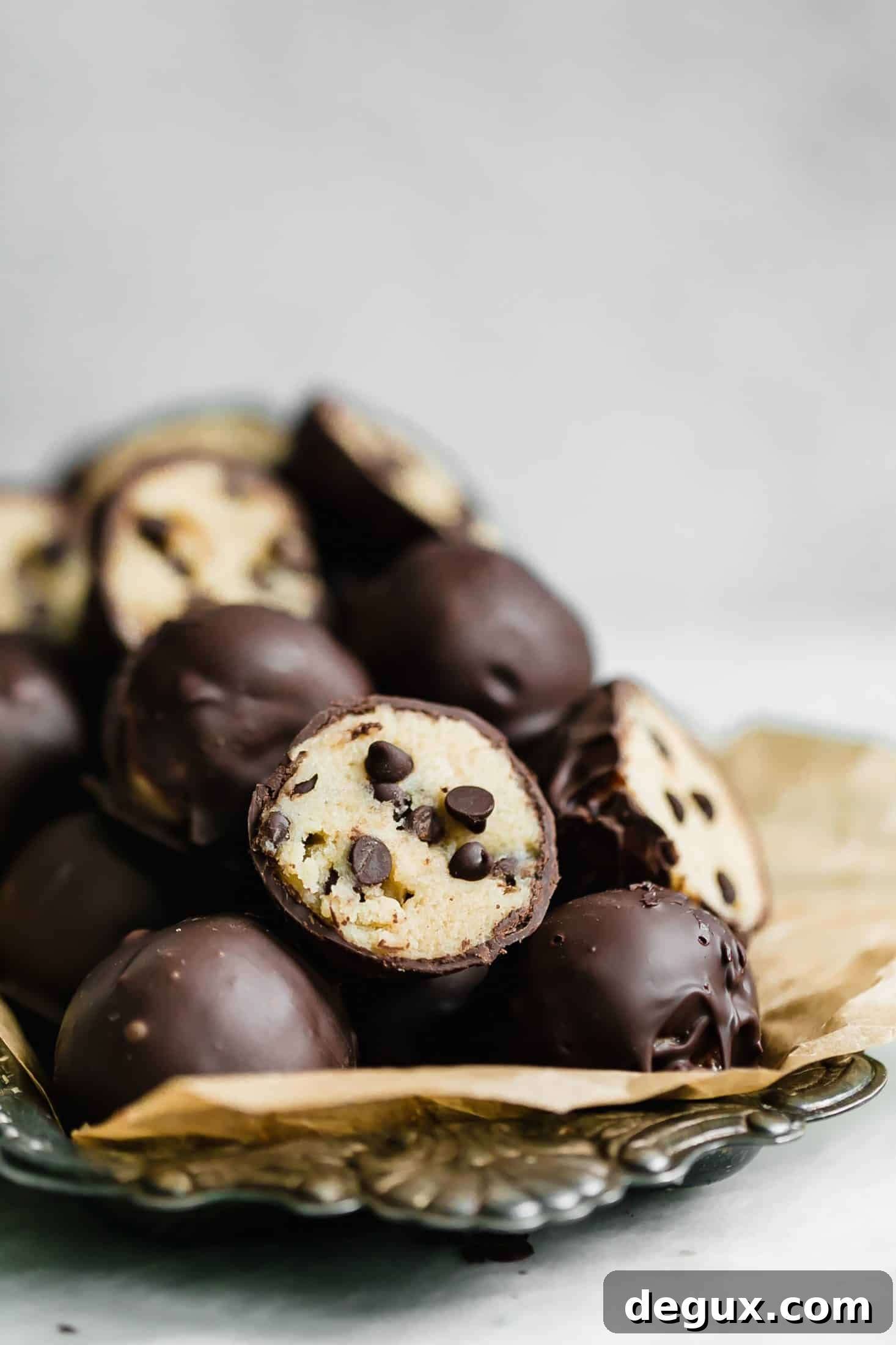 Cookie Dough Truffles Recipe: No-Bake Dessert Bites 2 cookie dough truffles I howsweeteats.com #cookiedough #truffles #christmas #cookies