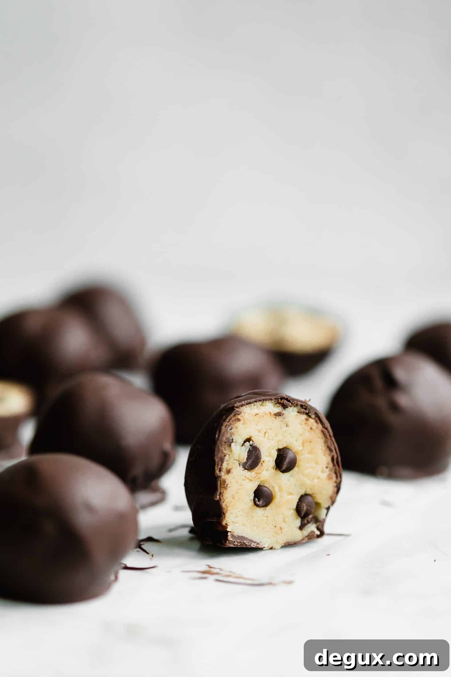 Cookie Dough Truffles Recipe: No-Bake Dessert Bites 7 cookie dough truffles I howsweeteats.com #cookiedough #truffles #christmas #cookies