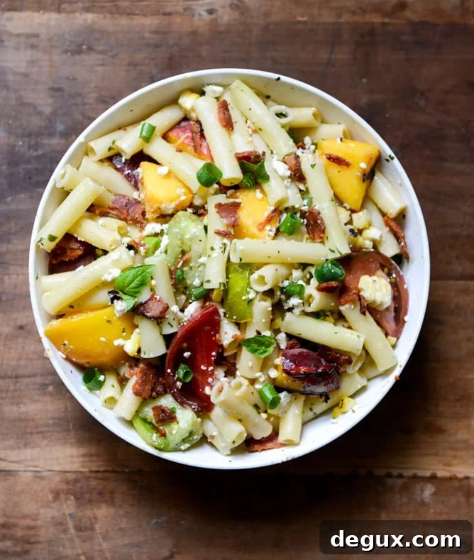 Smoky Heirloom Tomato and Grilled Peach Pasta Salad with Basil Vinaigrette Smoky Heirloom Tomato and Grilled Peach Pasta Salad with Basil Vinaigrette