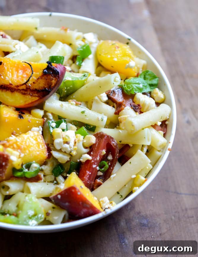 Smoky Heirloom Tomato and Grilled Peach Pasta Salad with Basil Vinaigrette Smoky Heirloom Tomato and Grilled Peach Pasta Salad with Basil Vinaigrette