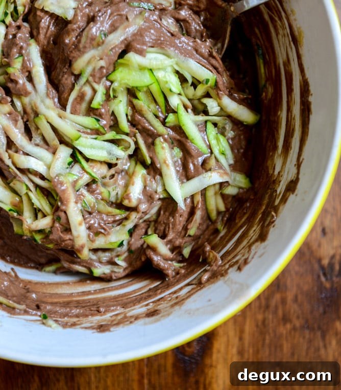 Whole Wheat Chocolate Fudge Zucchini Snack Cake with Candied Pistachios I howsweeteats.com Whole Wheat Chocolate Fudge Zucchini Snack Cake with Candied Pistachios I howsweeteats.com