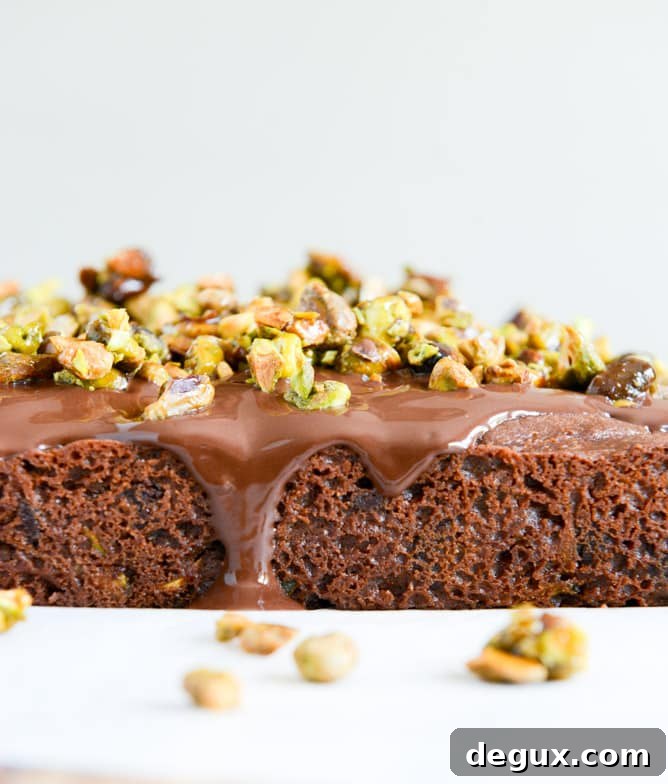 Whole Wheat Chocolate Fudge Zucchini Snack Cake with Candied Pistachios I howsweeteats.com Whole Wheat Chocolate Fudge Zucchini Snack Cake with Candied Pistachios I howsweeteats.com