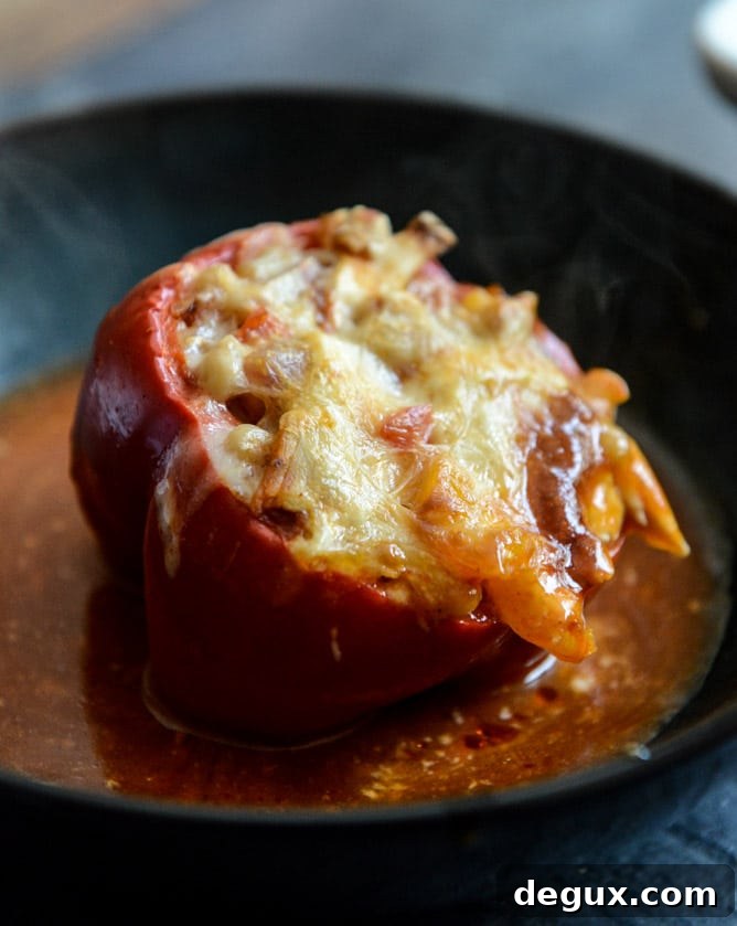 White Bean + Chicken Enchilada Stuffed Peppers I howsweeteats.com
