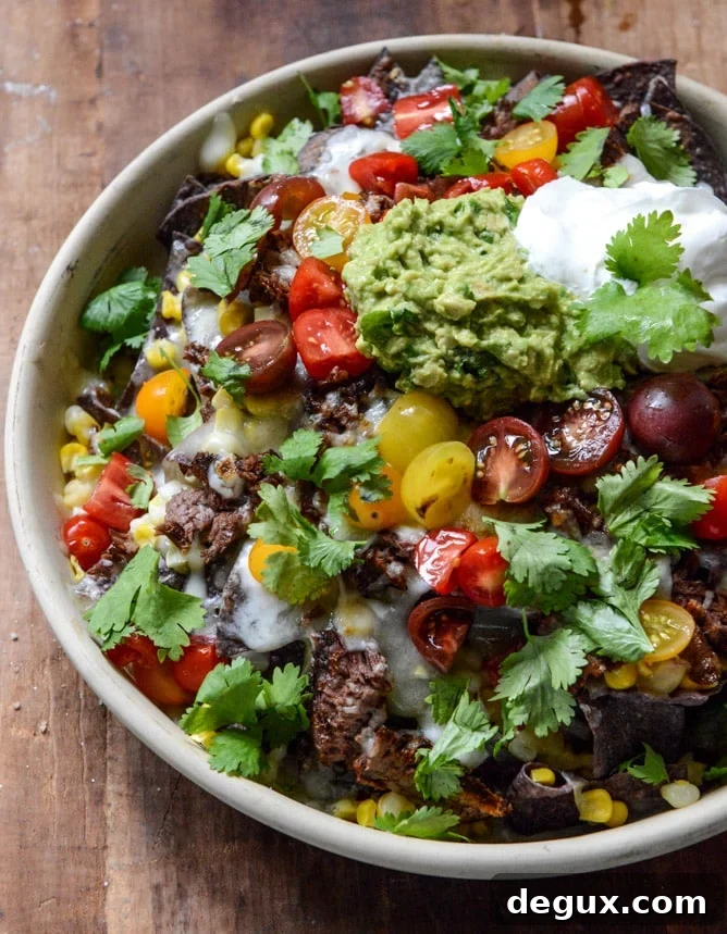 Crockpot Carne Asada Nachos I howsweeteats.com Crockpot Carne Asada Nachos I howsweeteats.com