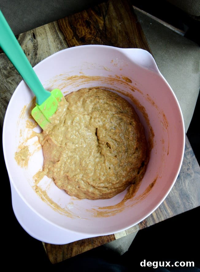 Whole Wheat Pumpkin Almond Muffins I howsweeteats.com